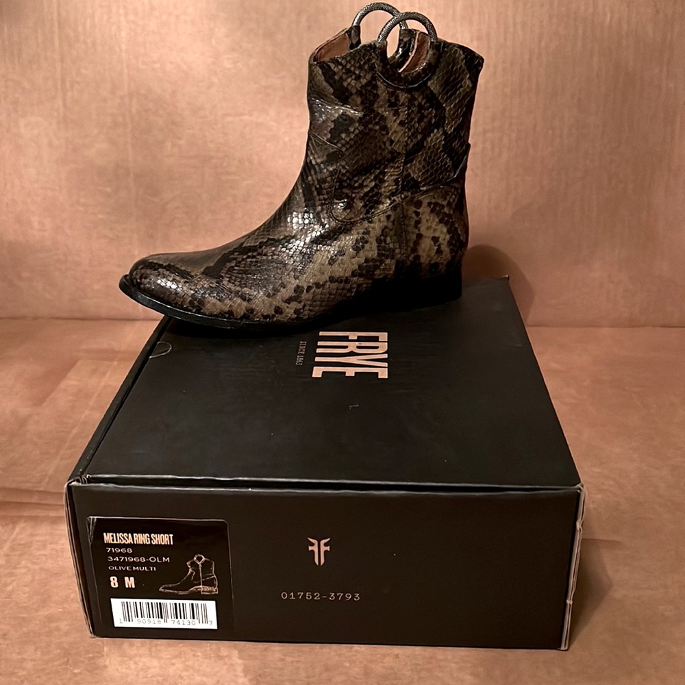 New in box, never worn. Melissa ring short in olive-multi snake print leather.